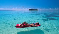 relaxing on a beach in Maldives